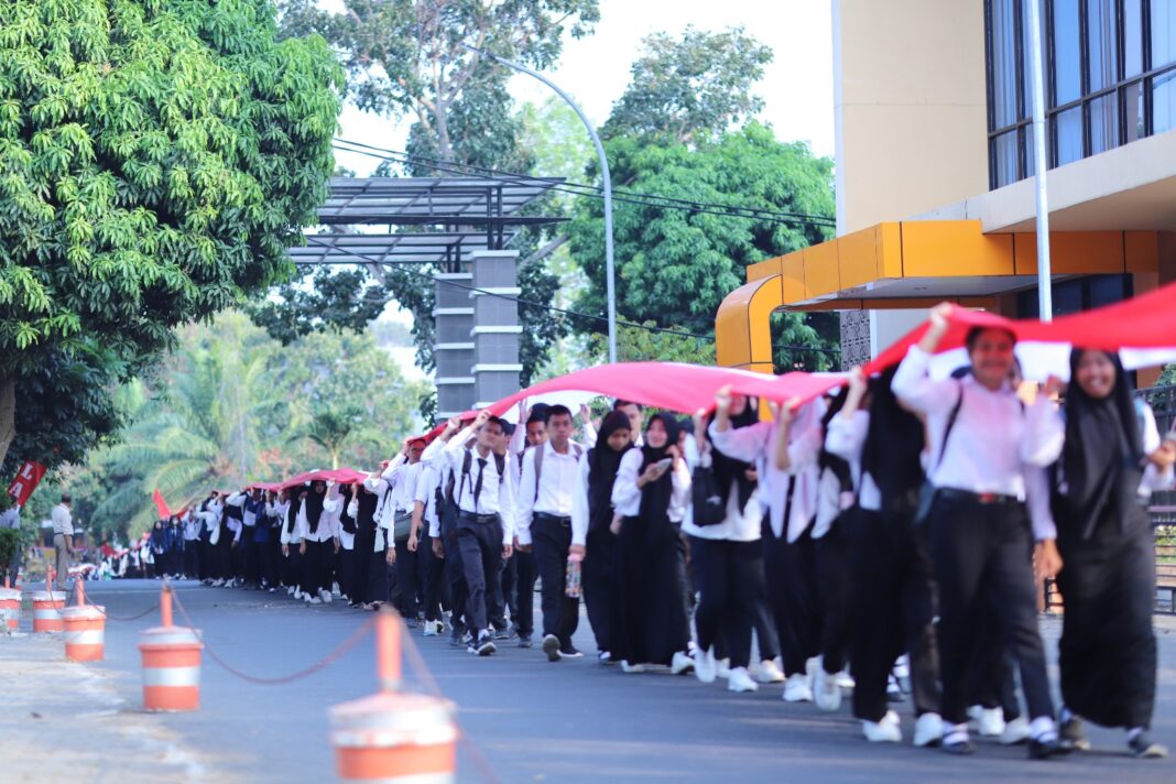 Kirab Bendera Merah Putih Universitas Lampung Wujud Cinta Tanah Air dan Bangsa