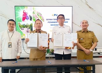 Bupati Tulang Bawang Qudrotul Ikhwan Hadiri Serah Terima BMN Inpres Jalan Daerah