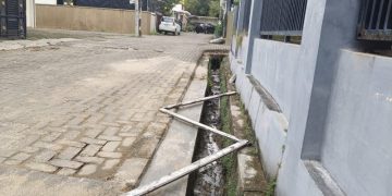 RT 007 Perum Bumi Puspa Kencana Selesaikan Perbaikan Jalan Ambles dan Pondasi Rusak
